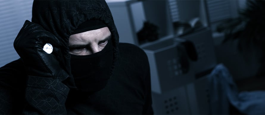 masked-burglar-with-flashlight
